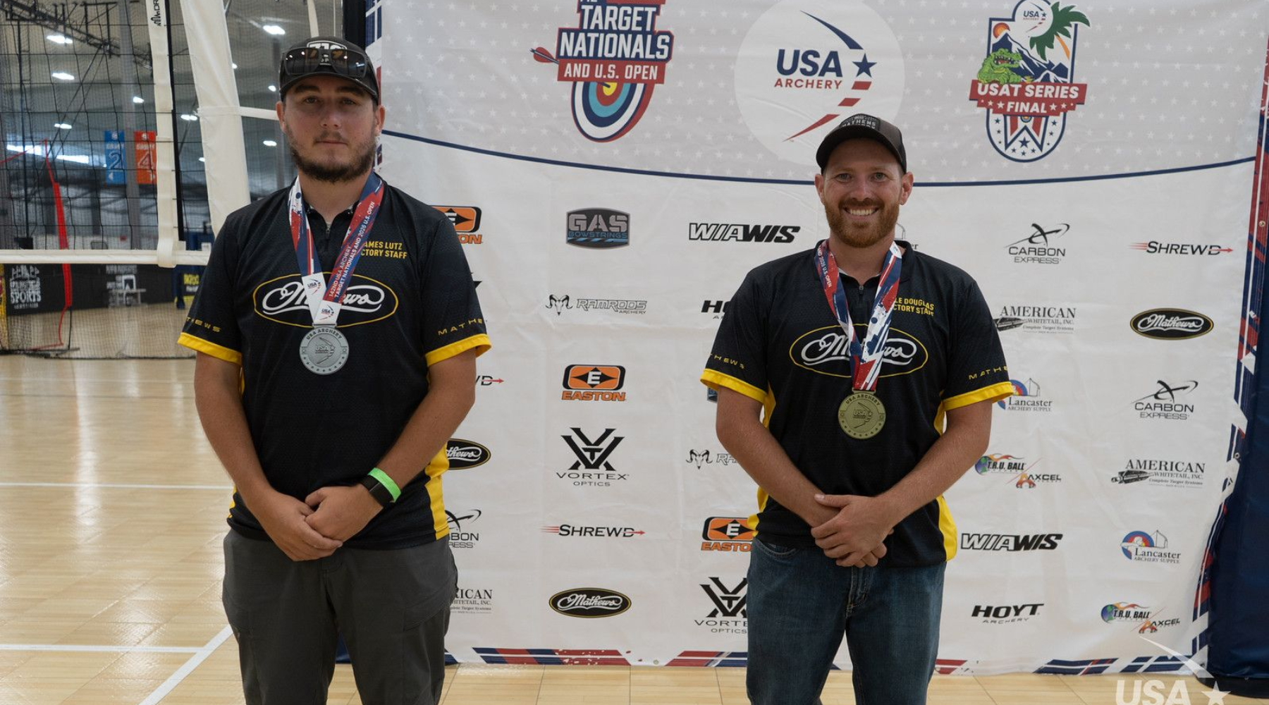 Kyle Douglas and Dewey Hathaway celebrating Gold Tip championship wins at the US Target Championship and US Open