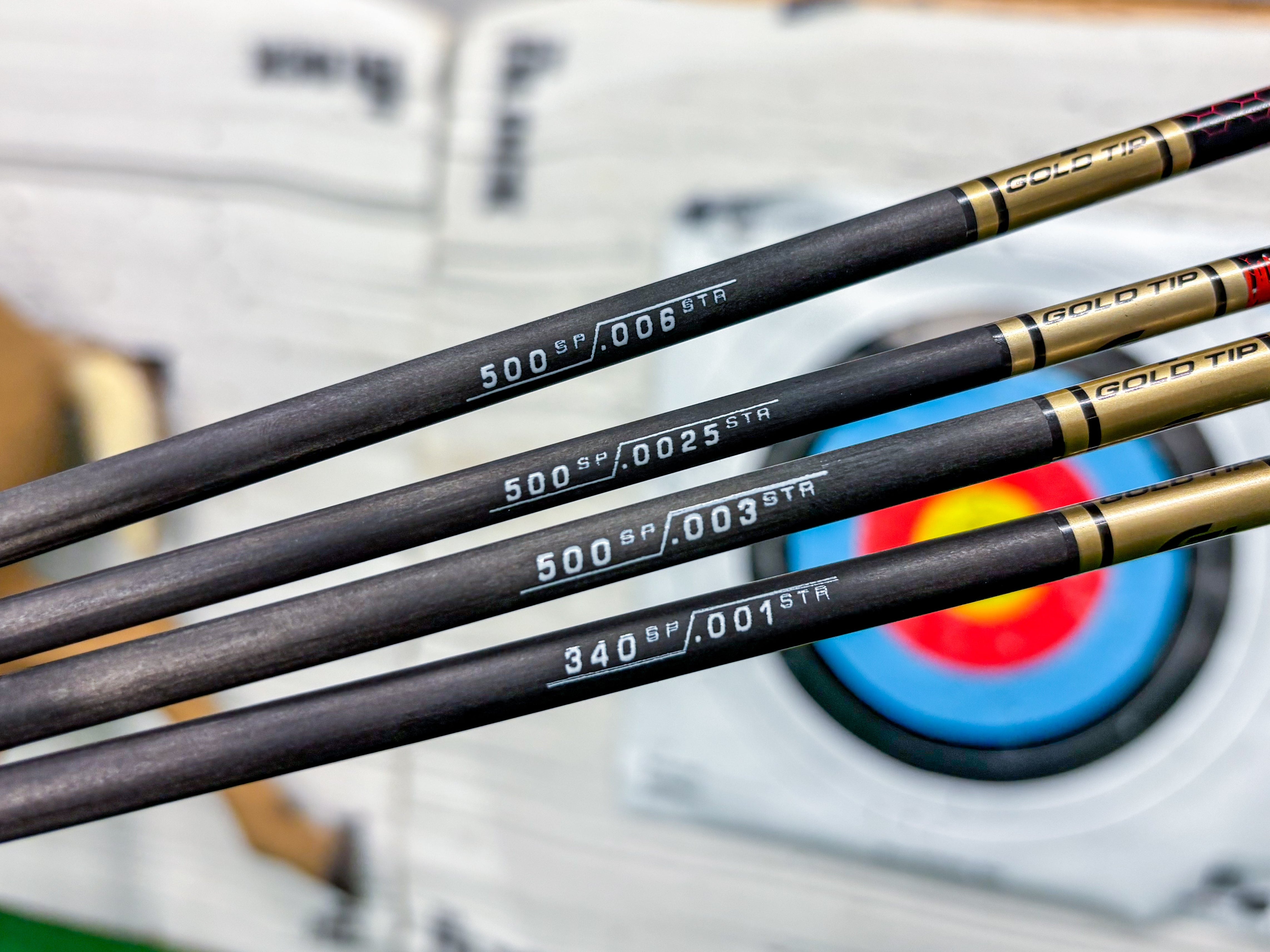 Arrow Spine & Straightness shown on a set of Gold Tip Arrows
