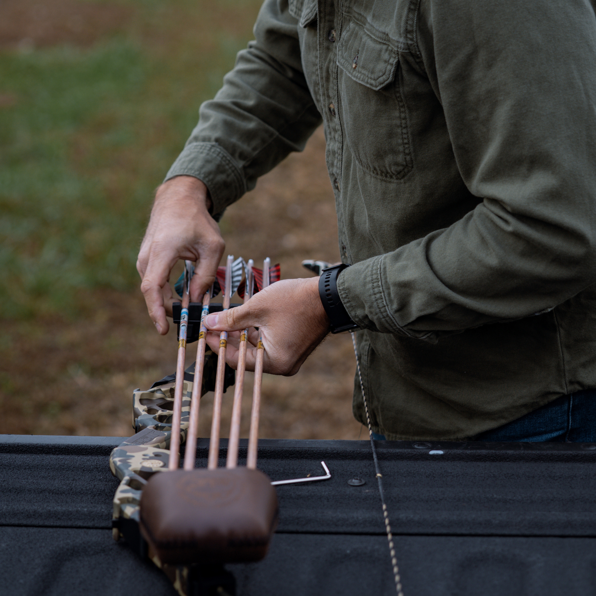 Team Gold Tip Placing Traditional XT Arrows in Quiver